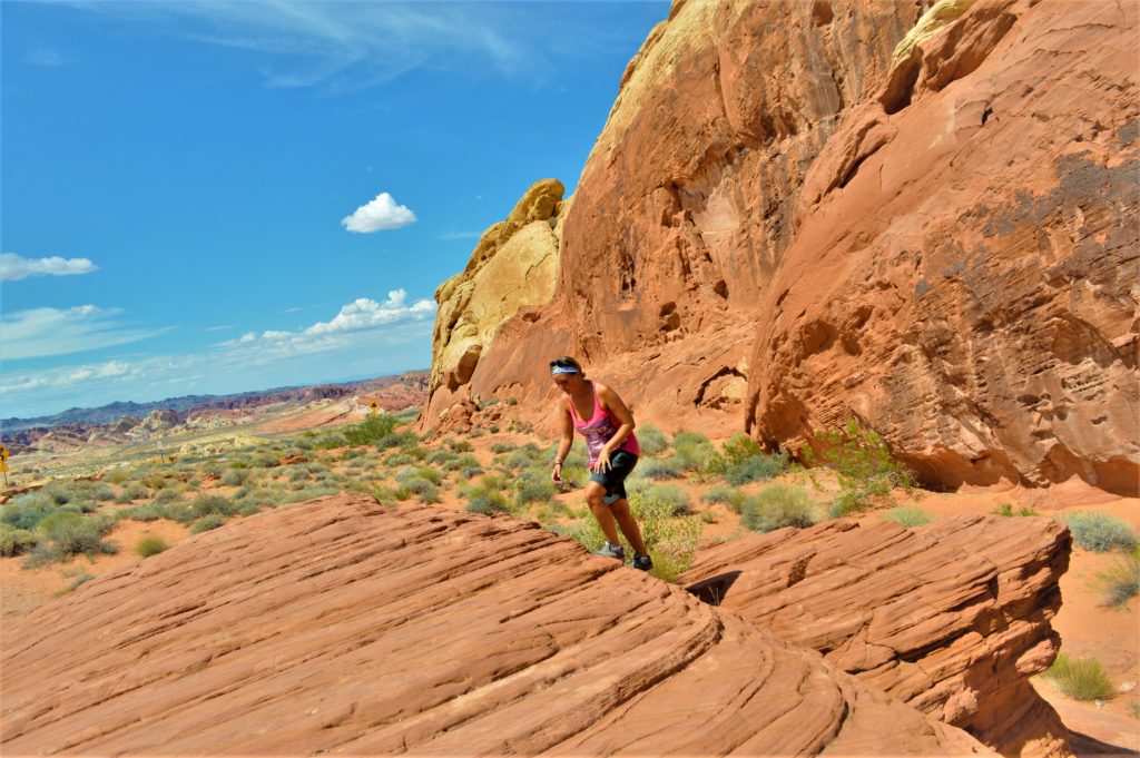 Climbing rocks at the valley of fire state park, utah