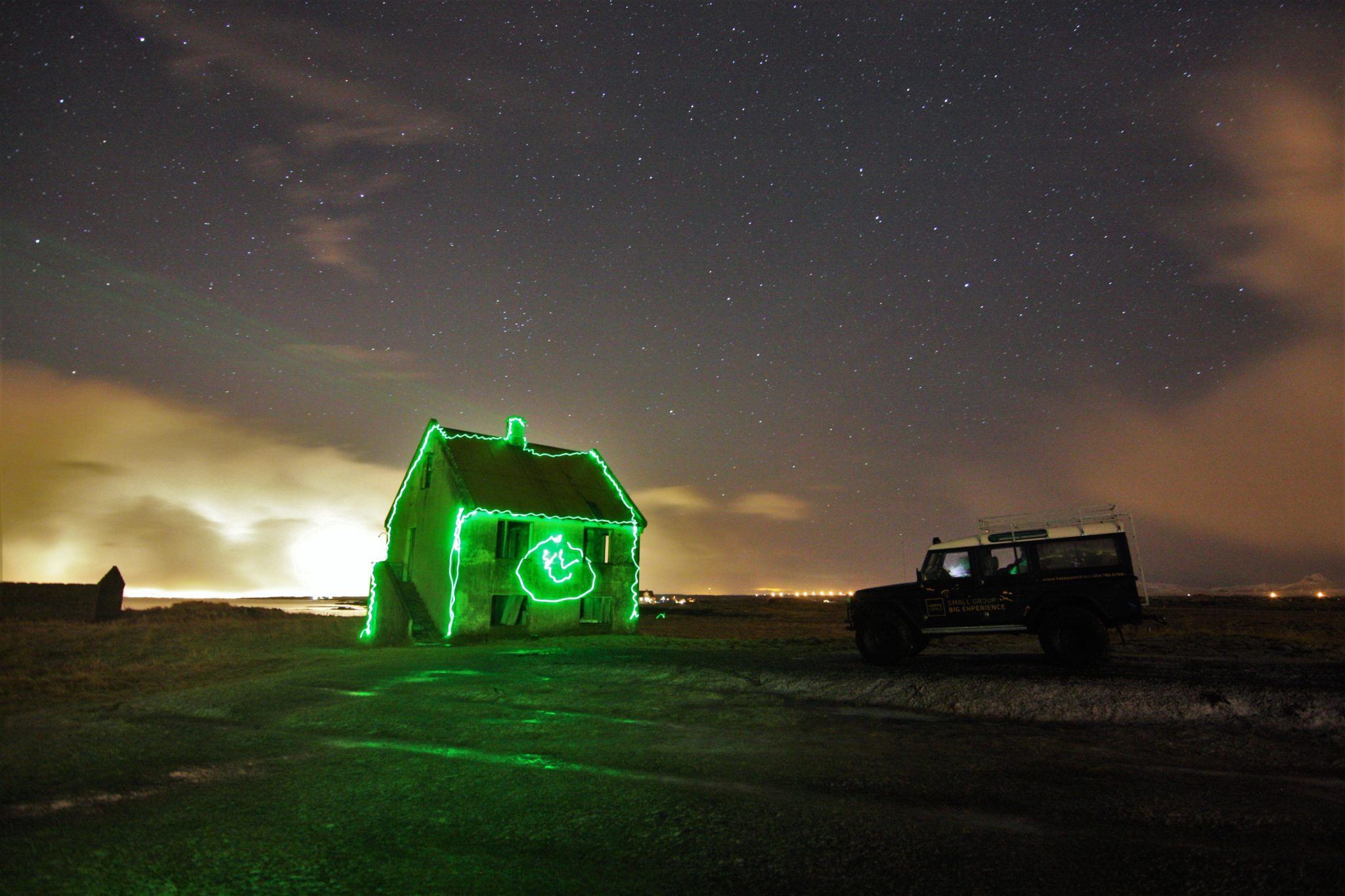 House on peninsula, Northern Lights Tour, Happy World, Iceland