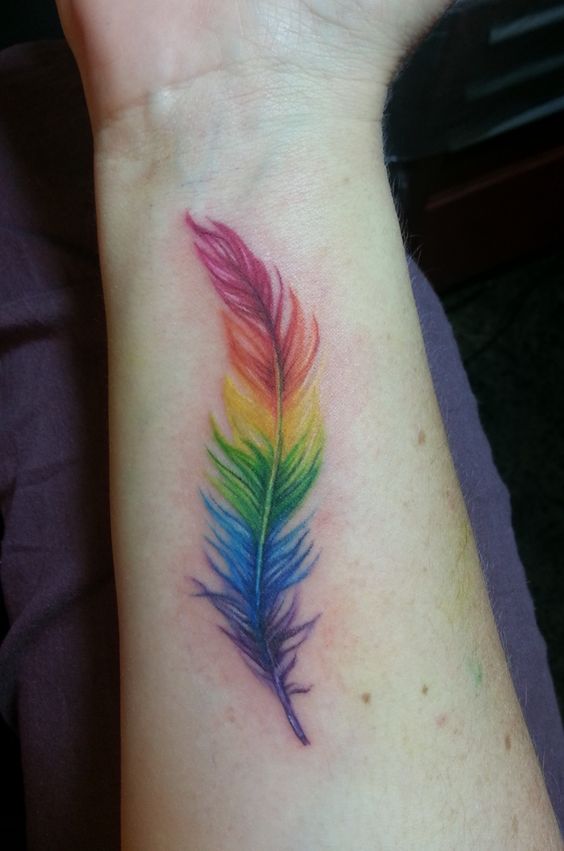 Rainbow feather tattoo