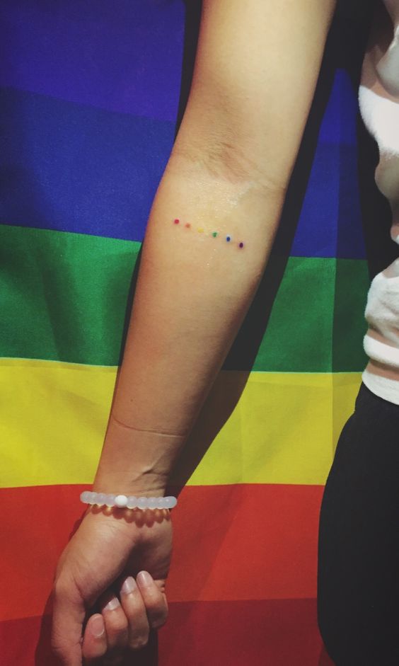rainbow dots tattoo