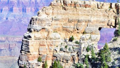 People walking on Angel's Window, Grand Canyon North Rim