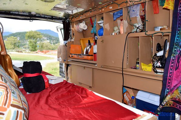 camper van conversion wood burning stove outdoorsy