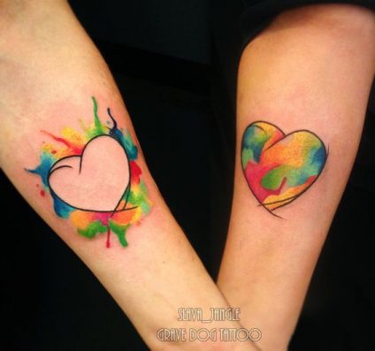 gay couple friends tattoo rainbow pride