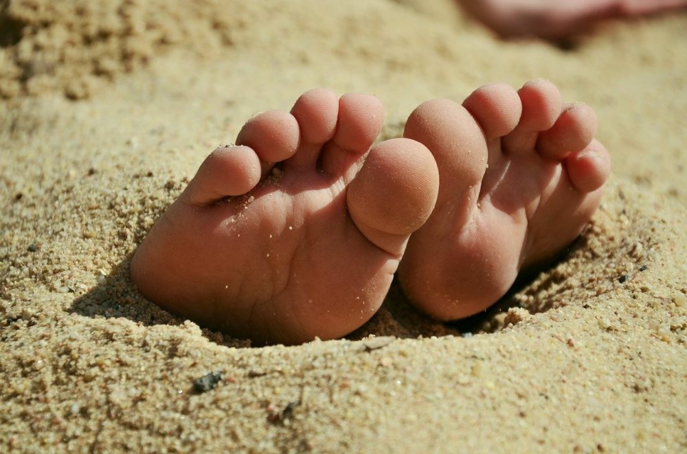benefits of earthing in sand and sea water