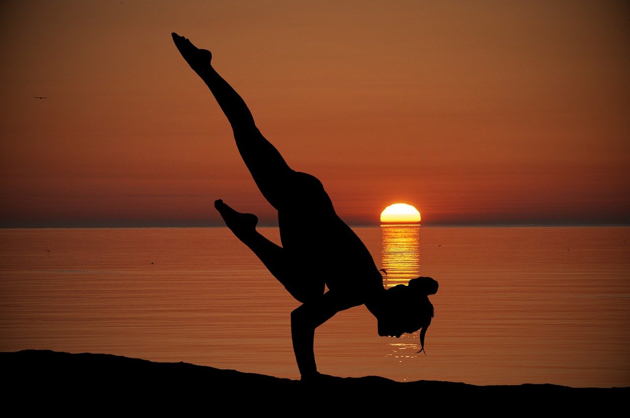 Yoga by the ocean can help relieve stress