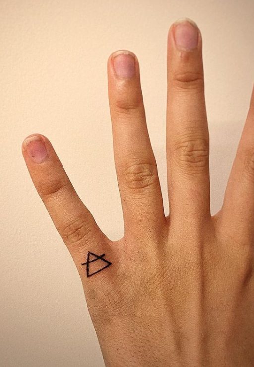 air element symbol poke finger tattoo