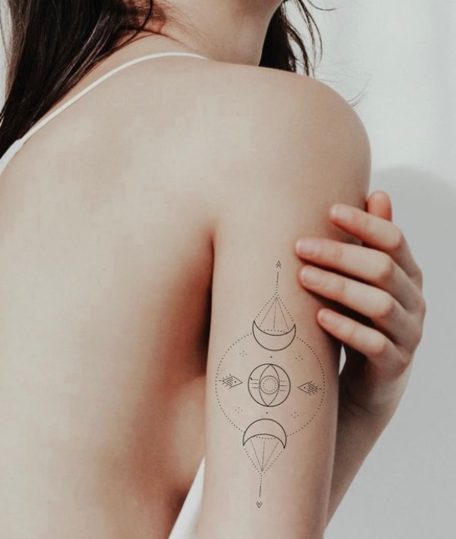 back of the arm spiritual tattoo