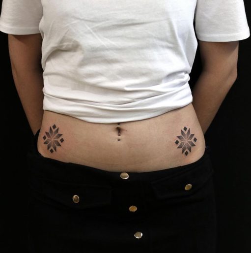 baltic symbol tribal tattoo hip bones