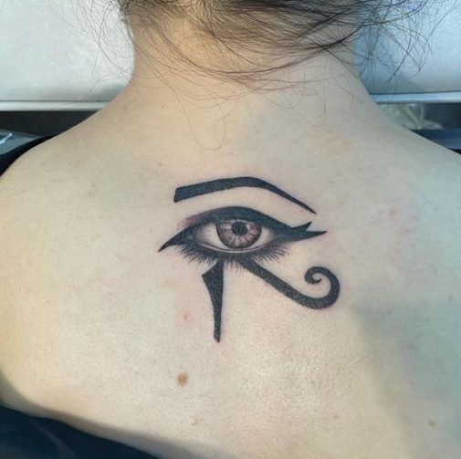 eye of horus back tattoo