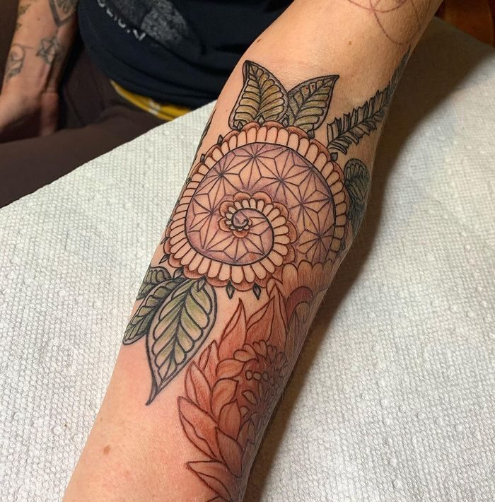 Fibonacci spiral spiritual tattoo earth universe