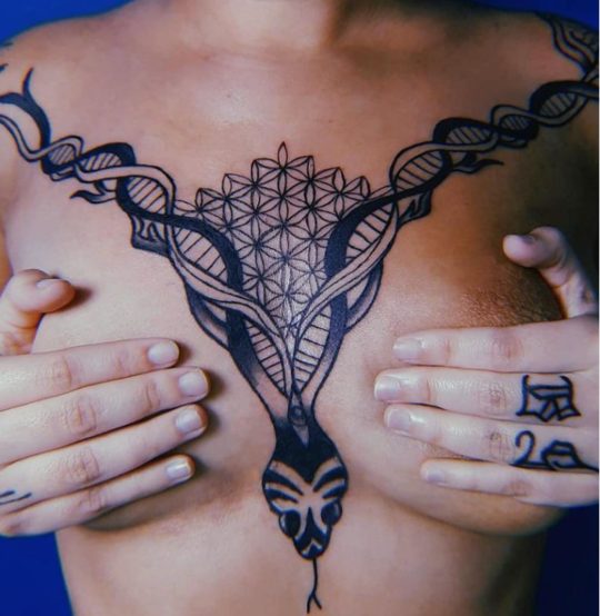 Flower of life tattoo design with serpent