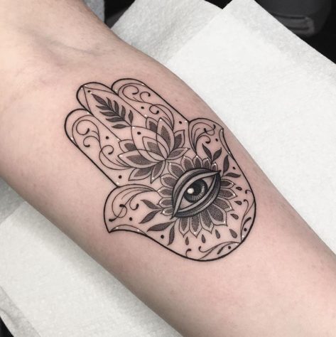 hamsa hand spiritual tattoo arm.