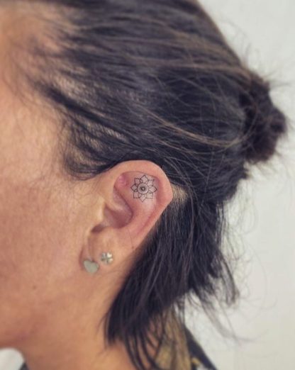 in ear small mandala tattoo