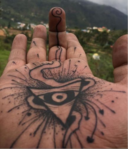 inside hand spiritual tattoo 