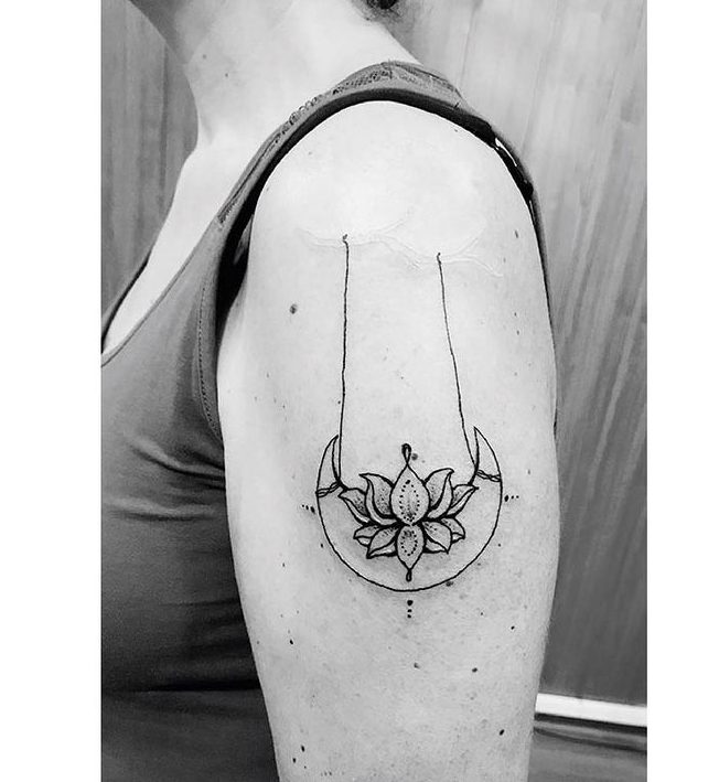 lotus flower moon tattoo arm