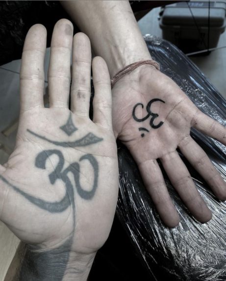 om palm of hand tattoo
