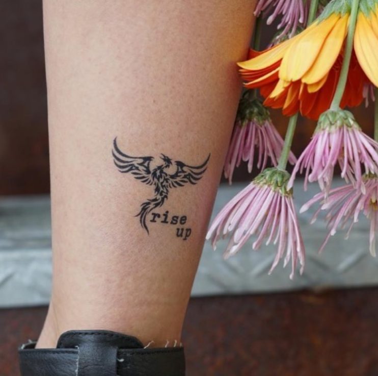phoenix rising leg tattoo design
