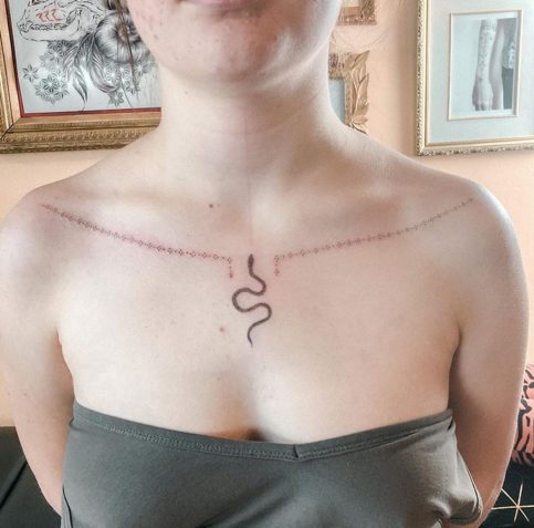 serpent tattoo chest spiritual ideas