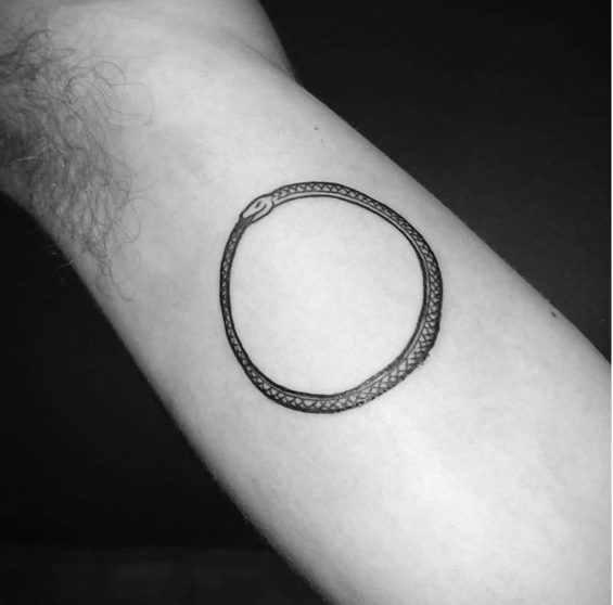snake eating itself break the cycle spiritual tattoo idea