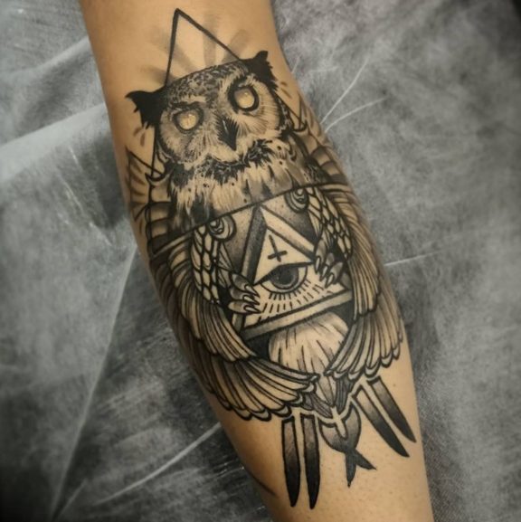 spiritual owl tattoo arm
