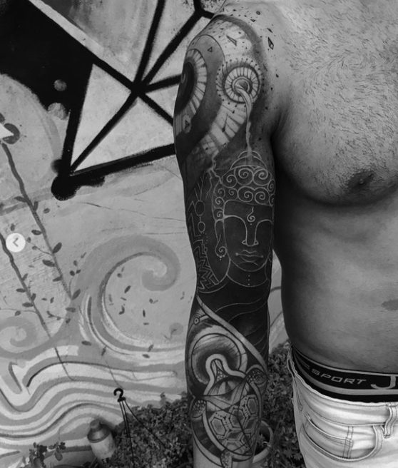 spiritual sleeve tattoo buddha