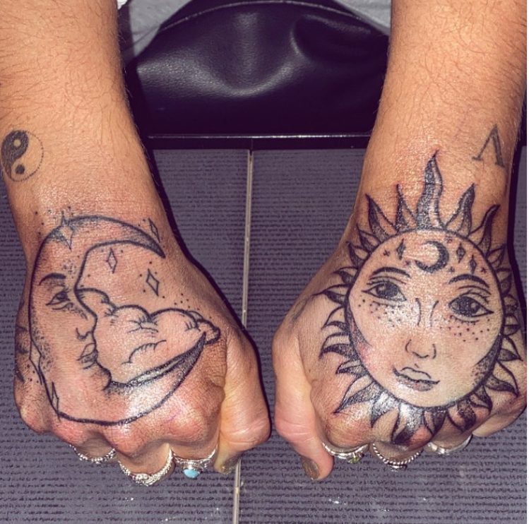sun and moon astrology hand tattoos 