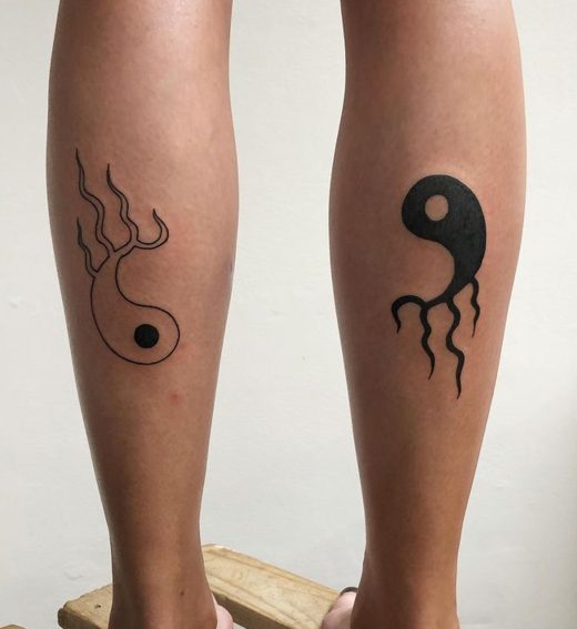 yin yang matching leg tattoos