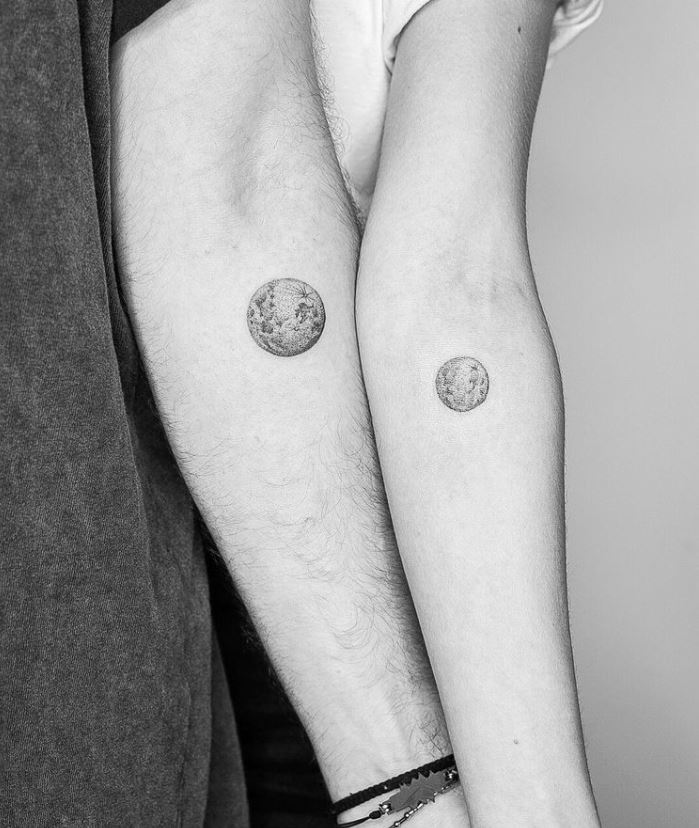 matching couple tattoos planets
