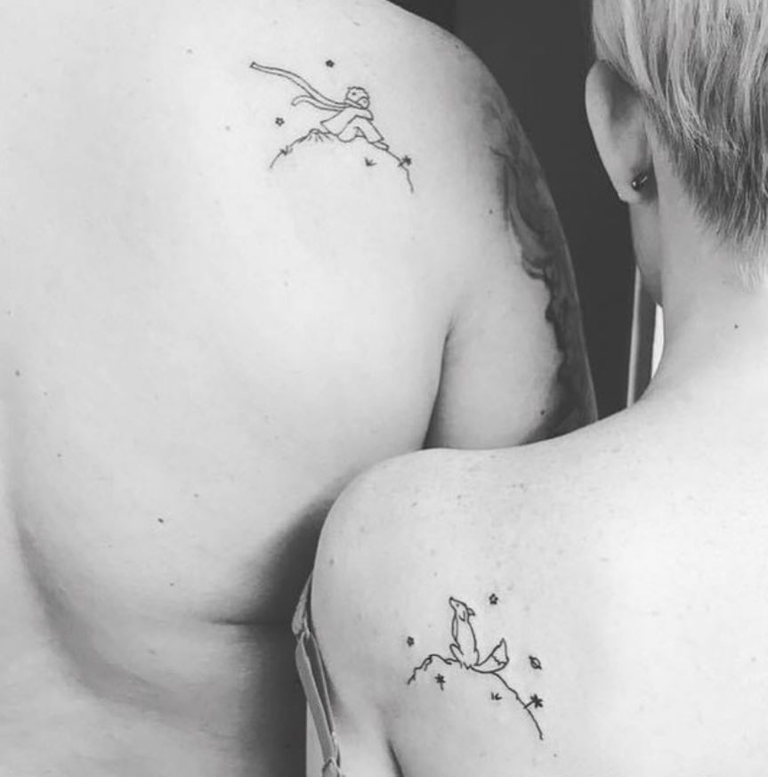 matching couple shoulder tattoos man dog