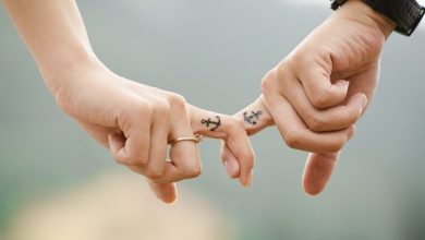 matching couple tattoo anchor finger